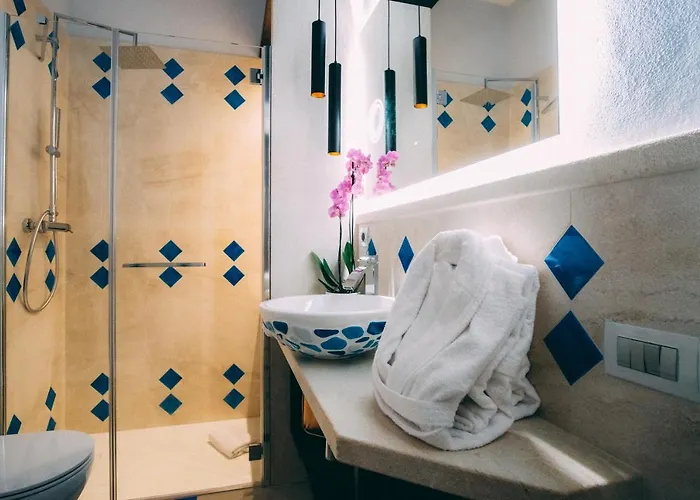 Aquamarina Pintadera Blu & 4* Porto Pino